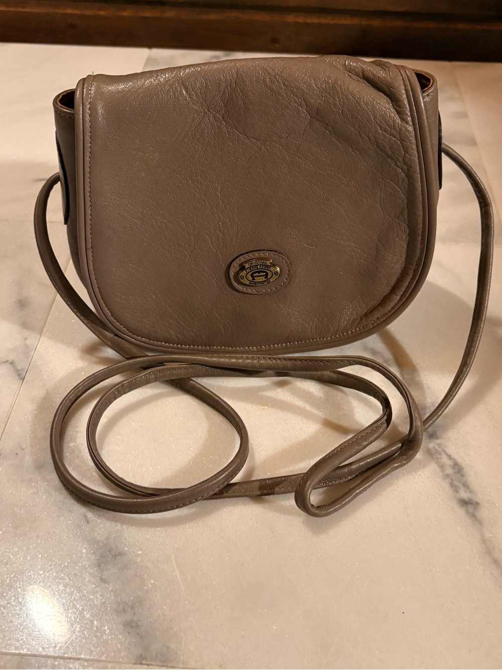 Etienne Agner Taupe Leather Crossbody with Signature Medallion